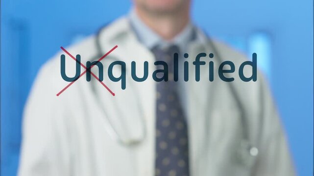 Medical professional crossing out the word unqualified with a red marker, changing the meaning to qualified. Conceptual footage about competence, skill, and expertise in healthcare services