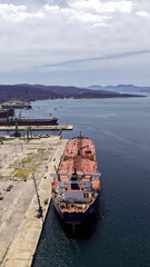 Fototapeta premium Aerial drone photo of famous Skaramangas Shipyards, an emblematic infrastructure in gulf of Elefsina, West Attica, Greece