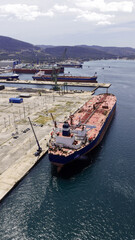 Fototapeta premium Aerial drone photo of famous Skaramangas Shipyards, an emblematic infrastructure in gulf of Elefsina, West Attica, Greece