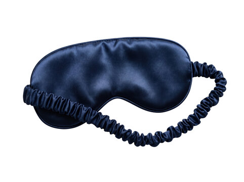 Dark blue plush sleep mask with elastic strap on white background eye mask travel accessory jet lag sleep aid beauty sleep comfort item self care stress relief relaxation accessory soothing