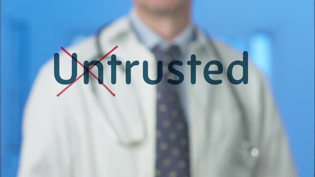 Unrecognizable male medical professional in a lab coat and stethoscope crossing out the word untrusted, symbolizing a shift towards trust, confidence, responsibility, and reliability