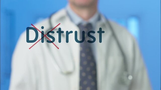 Male doctor in a white coat with a stethoscope crossing out the word distrust, transforming the concept into trust, confidence, and reliability in medical care and professional relationships