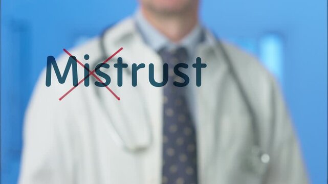 Medical professional with a stethoscope using a red marker to cross out the word mistrust on a glass screen, symbolizing building patient confidence, overcoming doubt, and establishing reliability