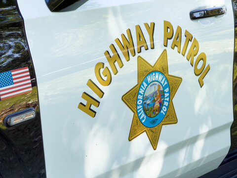 California Highway Patrol Door Badge and Highway Patrol Lettering on Police Vehicle Exterior
