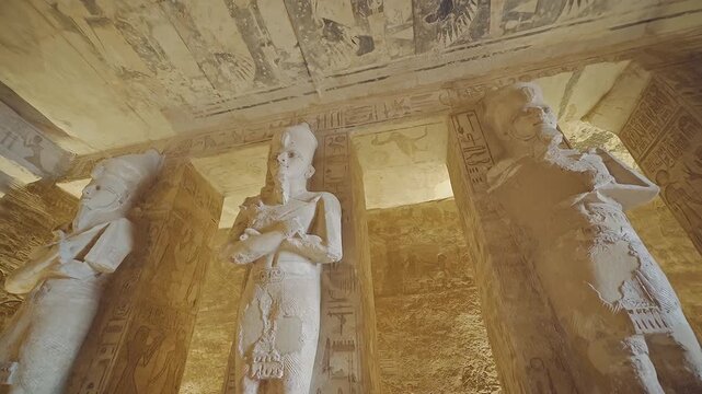 4k footage of Interior view of the famous abu simble temple that is decorated with gods figures and hieroglyphs in aswan in Egypt. 