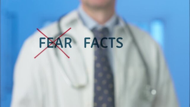 Medical professional crossing out the word fear with a red marker, emphasizing the importance of facts and evidence based information over anxiety in modern healthcare and medicine