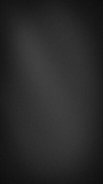 A vertical abstract grainy background backdrop with dark charcoal grey and black colors