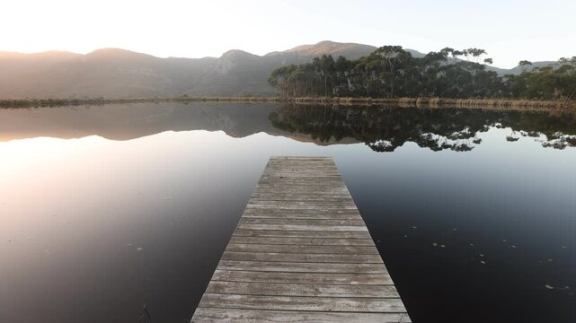 placid pond  and tree reflections, Stanford, South Africa
