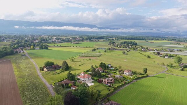 Serene Drone Flight Over Lake Geneva Charming Swiss Villages and Green Valleys in French Switzerland, Breathtaking Aerial Views of Lake Leman Picturesque Towns and Snow Capped Alps Switzerland