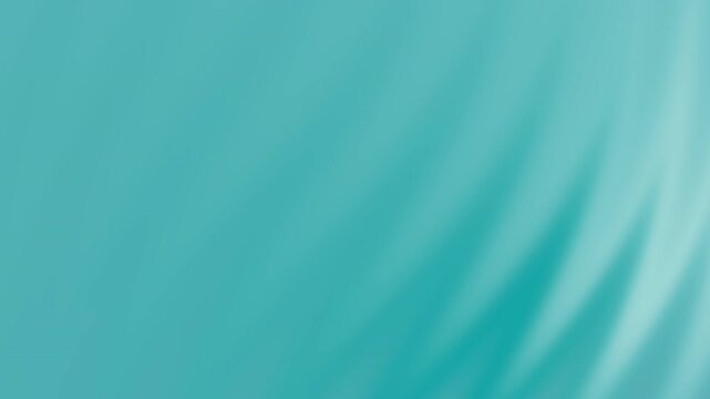 Soft teal fabric folds with light blue hues, perfect for backgrounds, texture design, fashion concepts, or product advertising visuals.
