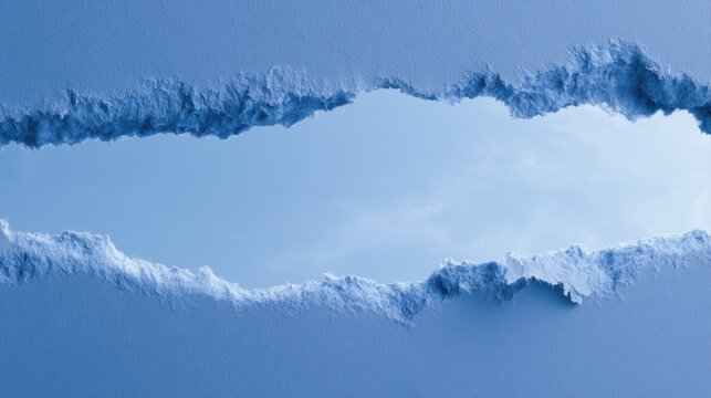 Blue ripped paper hole effect revealing bright sky behind dramatic torn opening