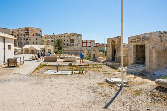 Small standalone tombs in the courtyard of the Catacombs of Kom El Shoqafa, an ancient underground archaeological site featuring Egyptian, Greek and Roman influences in Alexandria, Egypt.	