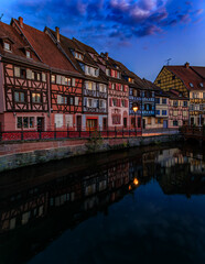 Fototapeta premium Half timbered houses by canals of Little Venice in Colmar, France