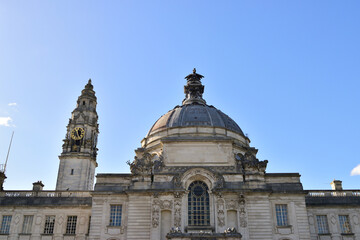 Obraz premium Majestic Dome and Clock Tower Under Clear Sky