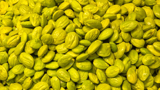 Full-Frame Background of Raw Bitter Beans (Petai) on Display in a Local Market