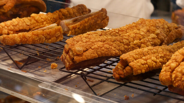Crispy Crispy Pork Belly on a Metal Cooling Rack