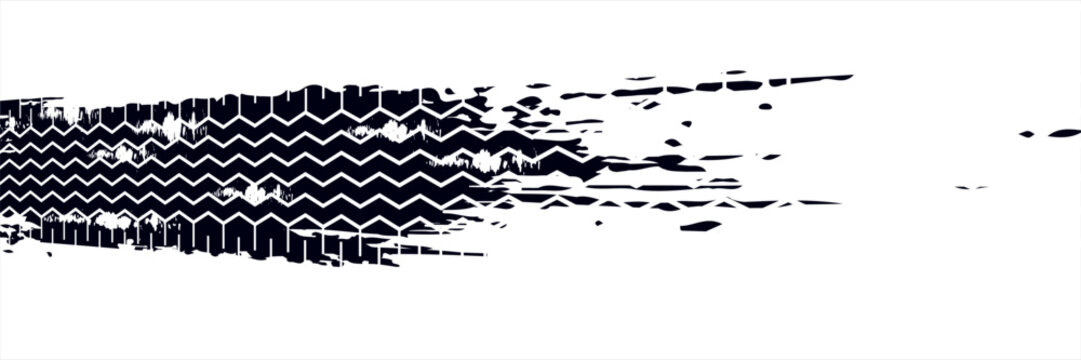 Set of black tire tracks and vehicle wheel marks on the road