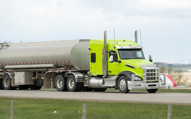 Heavy Cargo on the Road. A truck hauling freight along a highway © Stefon Linton