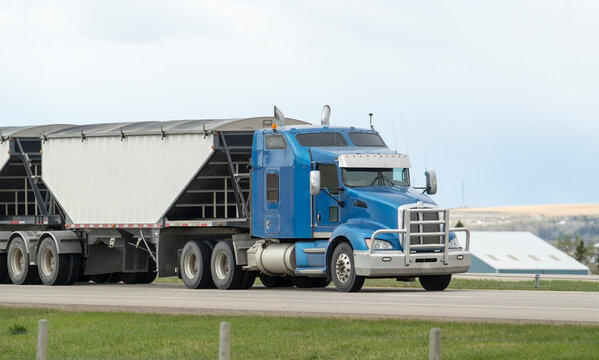 Heavy Cargo on the Road. A truck hauling freight along a highway