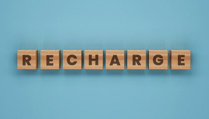 Naklejka premium Recharge Blocks on Blue Background