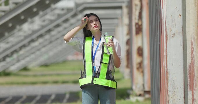 Female Filed Worker Exhausted After Long Hours on Site