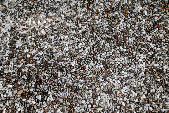 The sidewalk made from gravel