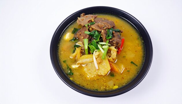 Sop buntut Indonesian oxtail soup, isolated on white background
