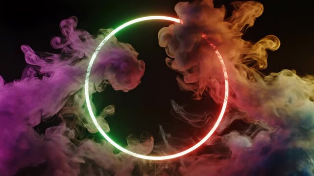 Bright neon light circle with a smooth color gradient from green to red, accented by plumes of colorful pink and blue smoke clouds at the base, isolated on a black background.