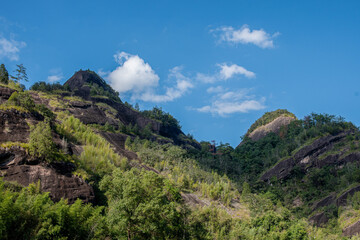 Fototapeta premium Wuyishan, Fujian Province China. Wuyi Mountain Scenery, Chinese National Park. China Danxia Exotic Cliff Scenery. UNESCO World Heritage, Daoism and Lingnan Culture.