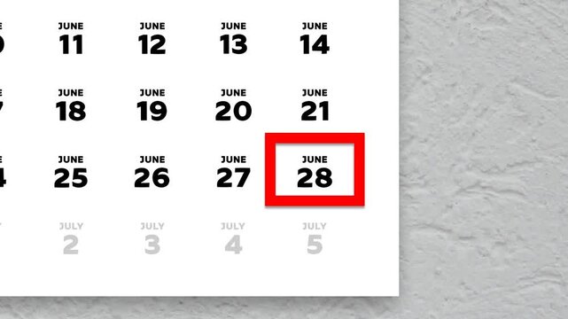 The date June 28th marked with a red cursor on the wall calendar 2026