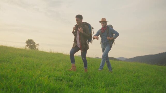 Journey through lush green fields, Hiking together across vibrant hills with joyful laughter and sunshine