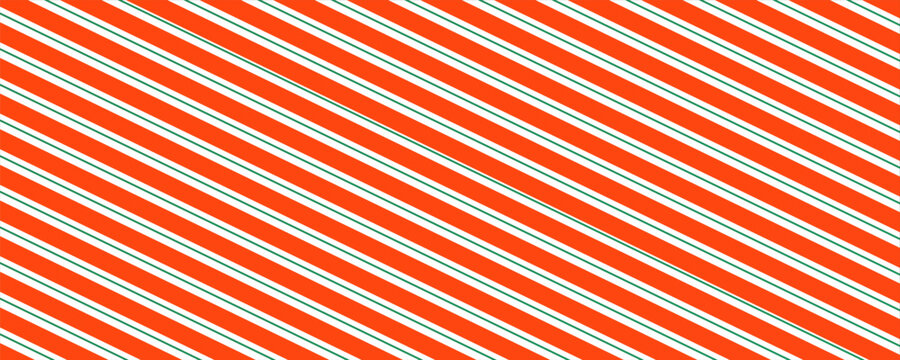 Christmas seamless pattern. Red and green diagonal stripes background. Candy cane repeating decoration wallpaper. Winter holiday lines backdrop. Xmas peppermint package wrapping print design. Vector