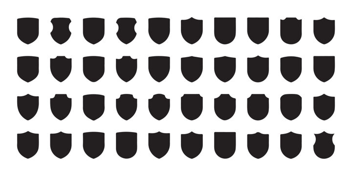 Collection of various shield emblems and heraldic shapes on white background for design.
