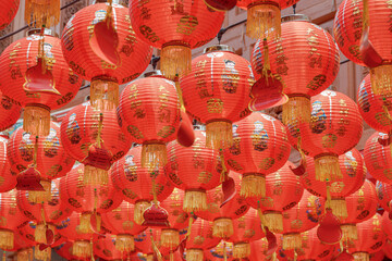 Fototapeta premium Ceiling from traditional Chinese red lanterns at Buddhist temple