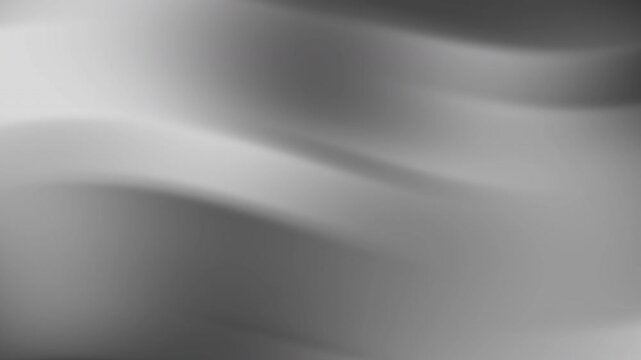 Gray gradients form abstract waves, ideal for backgrounds, banners, and artistic designs requiring a calming, flowing aesthetic with a modern twist.