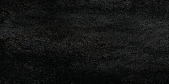 Dark textured background with rough stone or asphalt surface for design and decoration