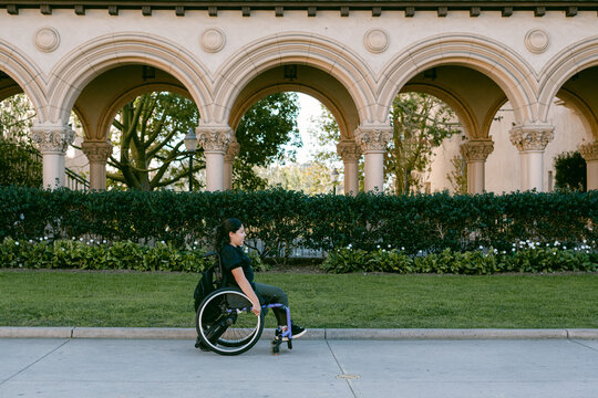 Young woman in a wheelchair at Balboa Park San Diego California