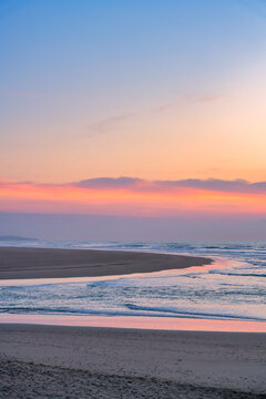 Scenic beach at sunset showing the Morocco coastline