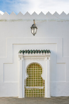 Asilah medina wall zellij tile arch traditional Moroccan architecture