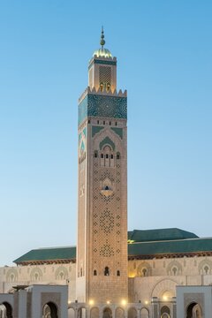 Ornate minaret of Hassan II Mosque at dusk in Casablanca, Morocco