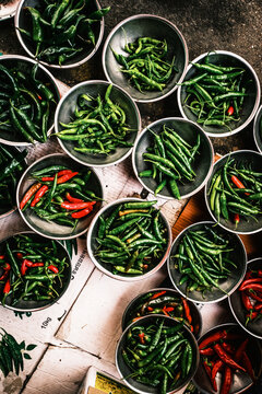 Bowls of green and red chili peppers at Jagalchi Market
