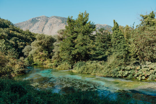 Crystal clear river and mountain landscape at Syri i Kalt&euml;r, Albania