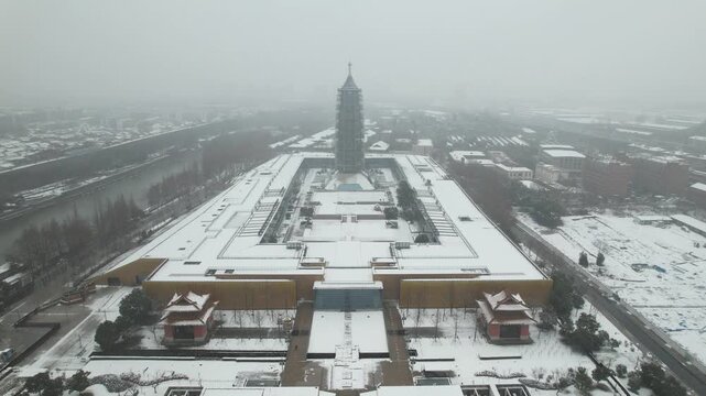 Snowy Grand Bao'en Temple Pagoda in Hazy Winter Nanjing in Grand Bao en Temple, Nanjing, China