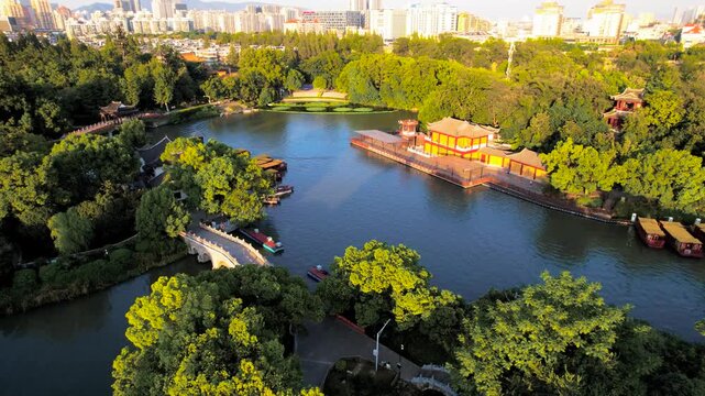 Green Lake Park in Kunming China with Pavilions and Skyline in Green Lake Park, Kunming, China