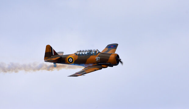 Vintage North American T-6 Harvard aircraft in flight