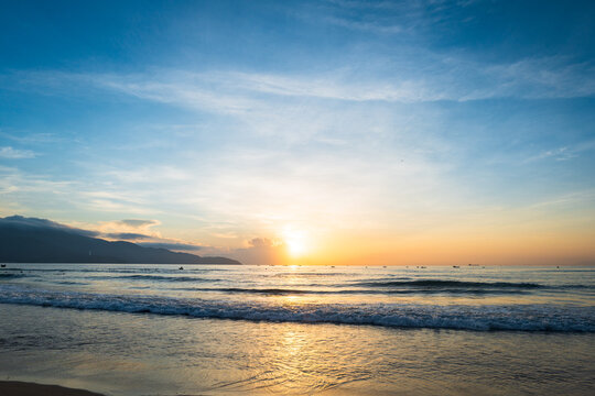 Sunrise at beach in Da Nang, Vietnam. Spectacular sunrise landscape in Danang, Vietnam, South East Asian beach.