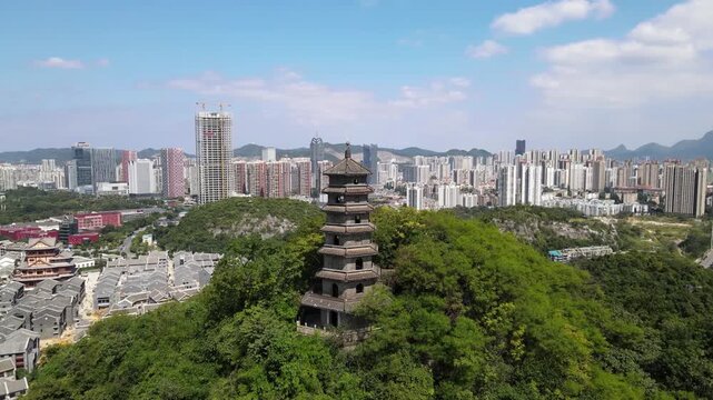 Ancient Pagoda Overlooking Modern Guiyang Skyline in Guizhou China in Guiyang, Guizhou, China