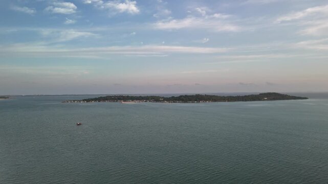 Aerial View of Mubud Island Scenery with Boat Passing by, Batam - 4K