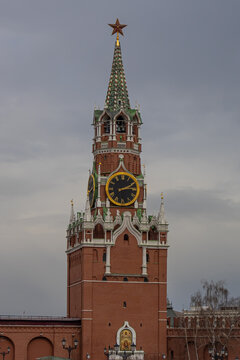 Spasskaya Tower on Red Square. The Spasskaya tower with chimes. The Moscow Kremlin and historical buildings. Cultural heritage of Russia.