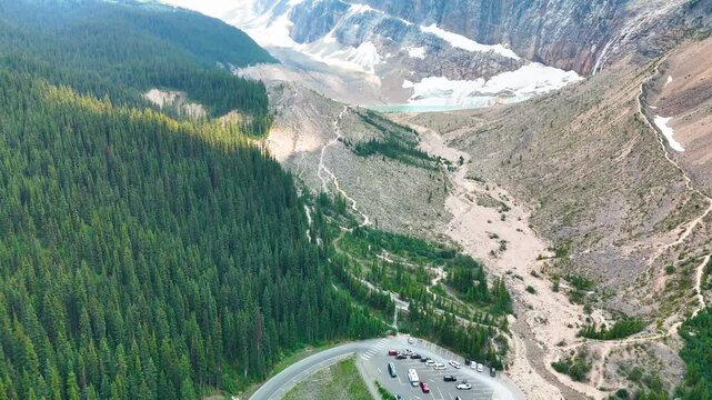 Jasper Alberta aerial view of Cavell Lake Trail showcasing turquoise water and mountain landscape